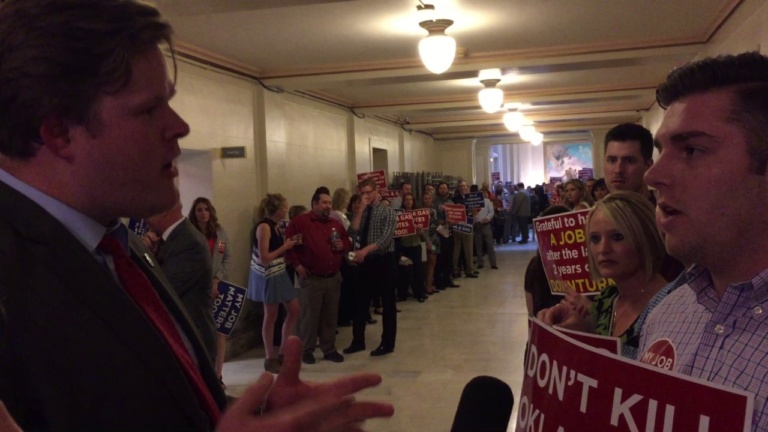 VIDEO: Rep. Forrest Bennett, demonstrator debate GPT