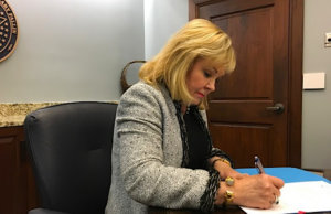 Fallin signs ‘ball and dice,’ repeal of hotel-motel tax Fallin signs hotel-motel tax repeal