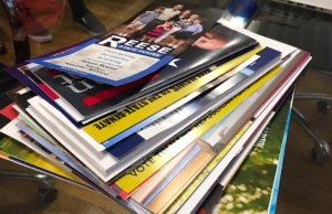 Primary colors podcast: Green lit, red runoffs, blue wave? primary mailers