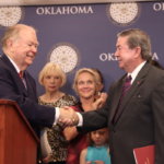 boren_edmonson handshake