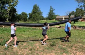 UCO students help clean up Arcadia Lake after flooding Arcadia Lake
