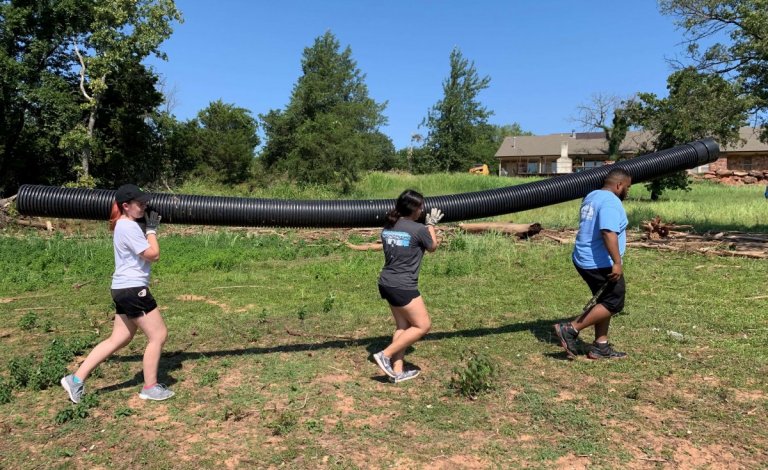 UCO students help clean up Arcadia Lake after flooding