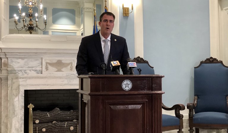 Stitt signs 2 of 3 bills to avoid April cuts, blames #okleg for ‘politics’