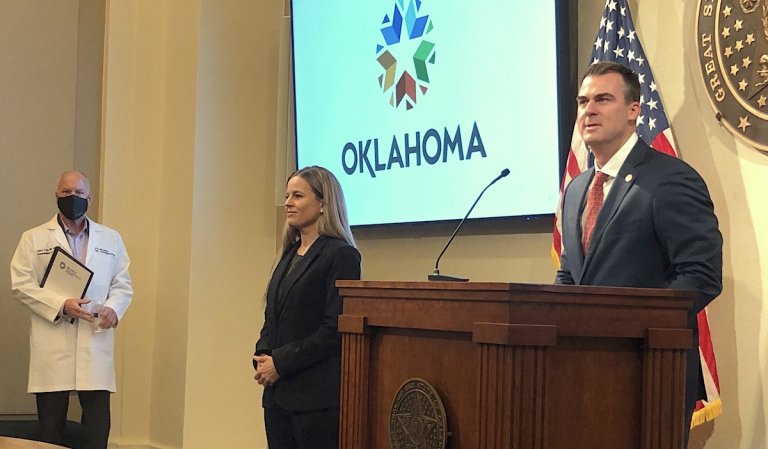 Stitt rolls back many COVID restrictions, but municipal mandates remain