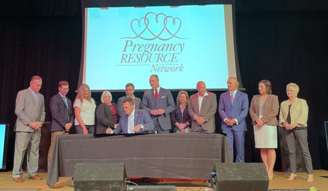 CEREMONIAL SIGNING 2 new abortion restrictions