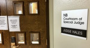 With criminal investigation pending, accuser dismisses protective order against John Woods John Woods