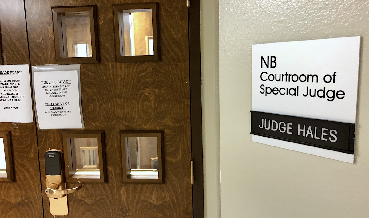 With criminal investigation pending, accuser dismisses protective order against John Woods