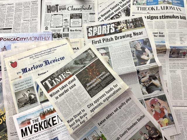Pile of papers will newspapers survive